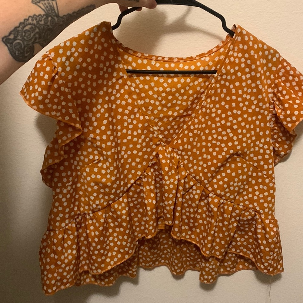 orange flowy top